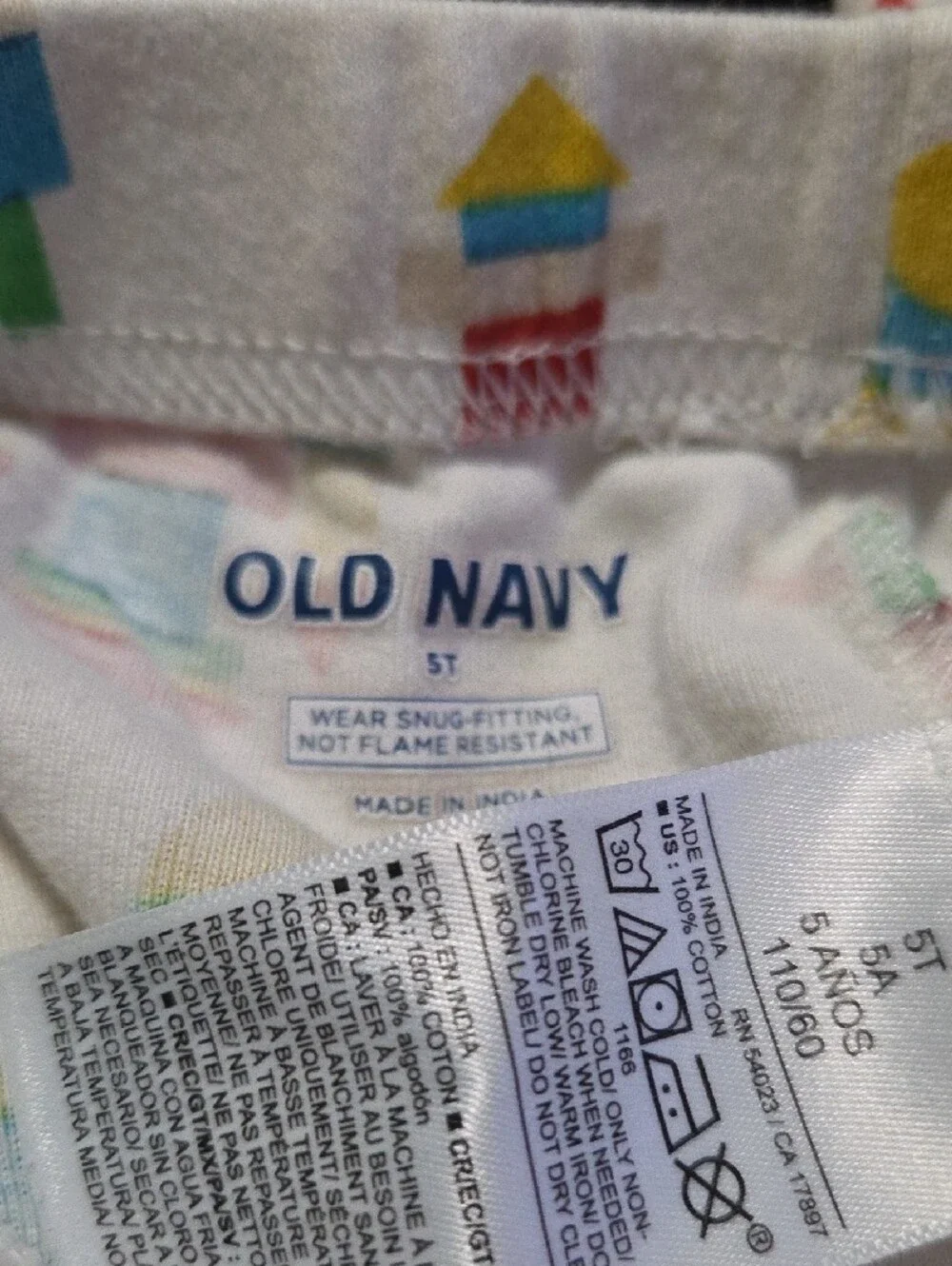 Old Navy White Kids Pajama Set with Red, Blue, Yellow, Green Prints